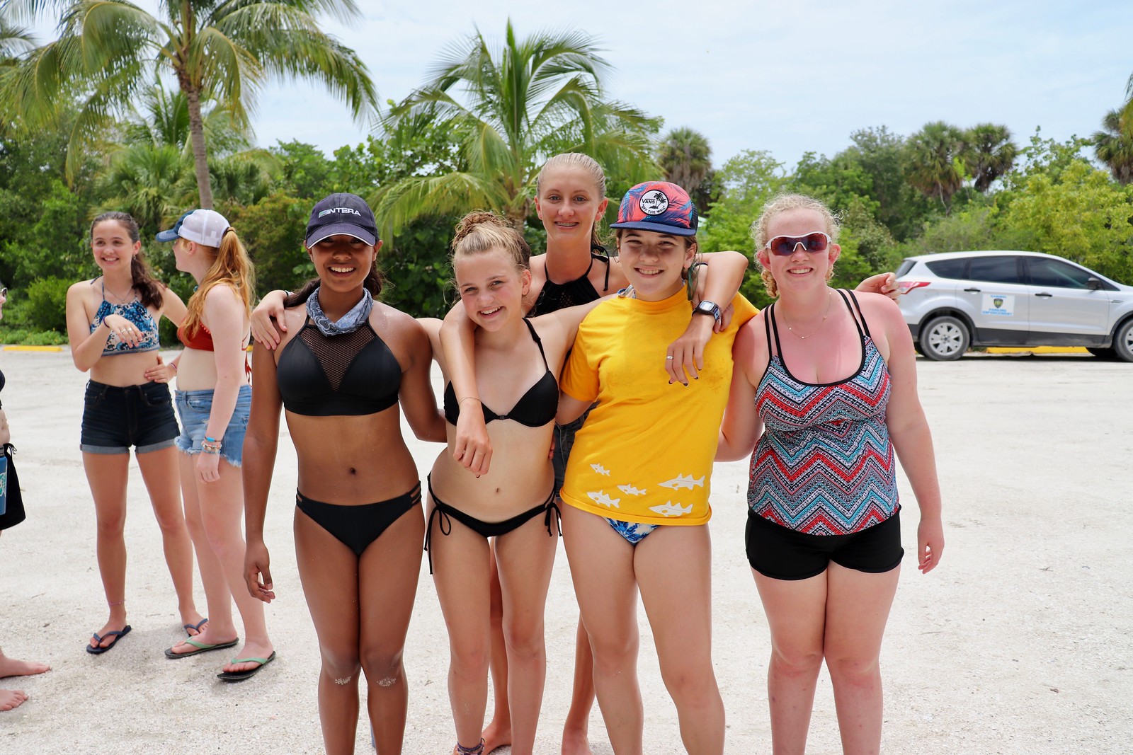 Campers posed for a photo while taking a break from learning the basics of vehicle maintenance. 