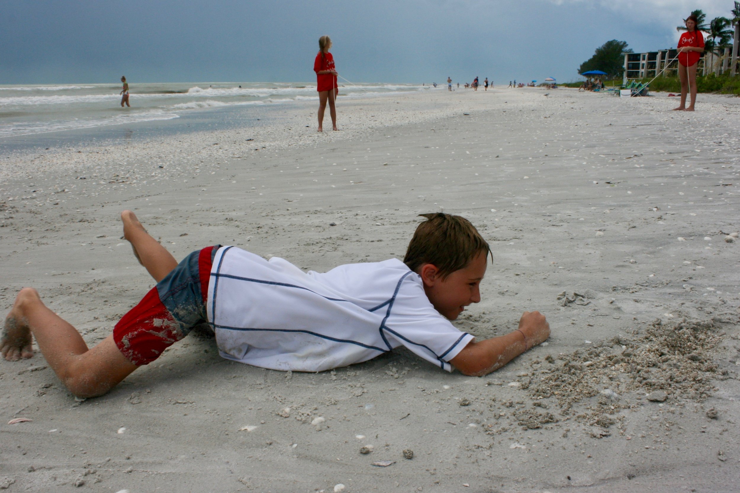 Campers crawled through an obstacle course like sea turtle hatchlings on their way to the sea.