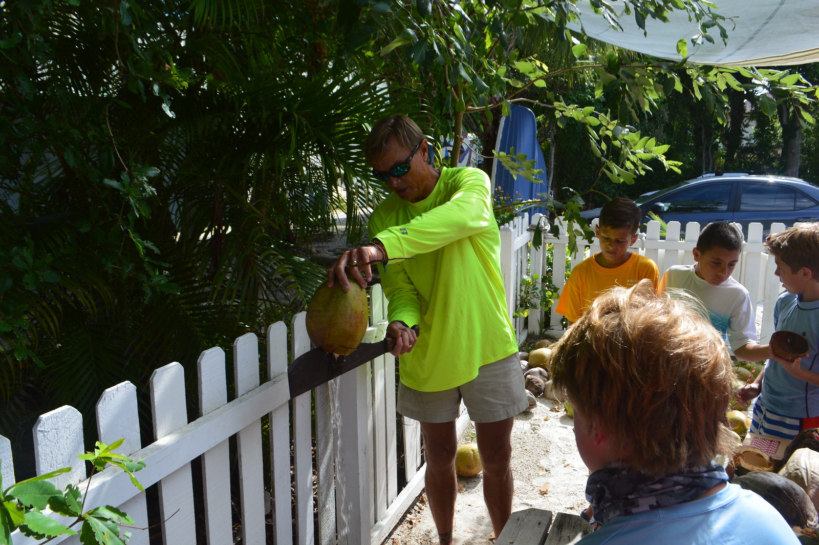 Doc Bruce demonstrated how to crack a coconut open. 