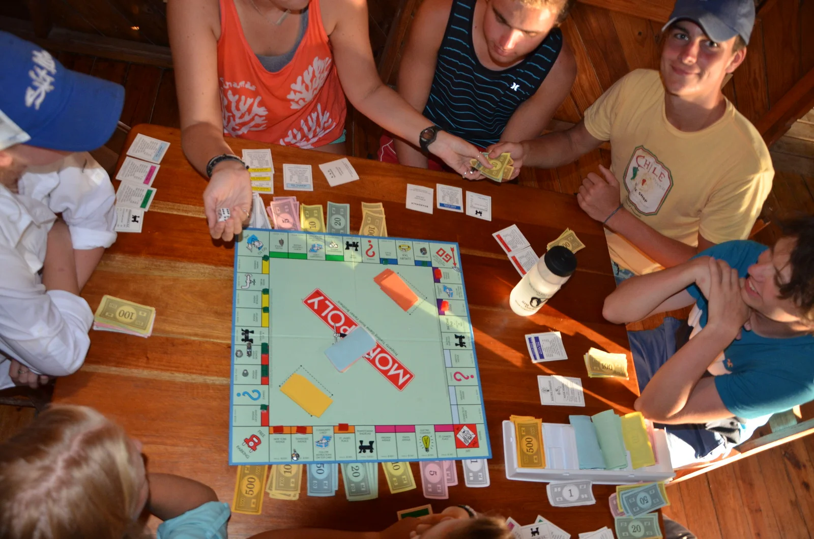 An exciting game of Monopoly after dinner. 