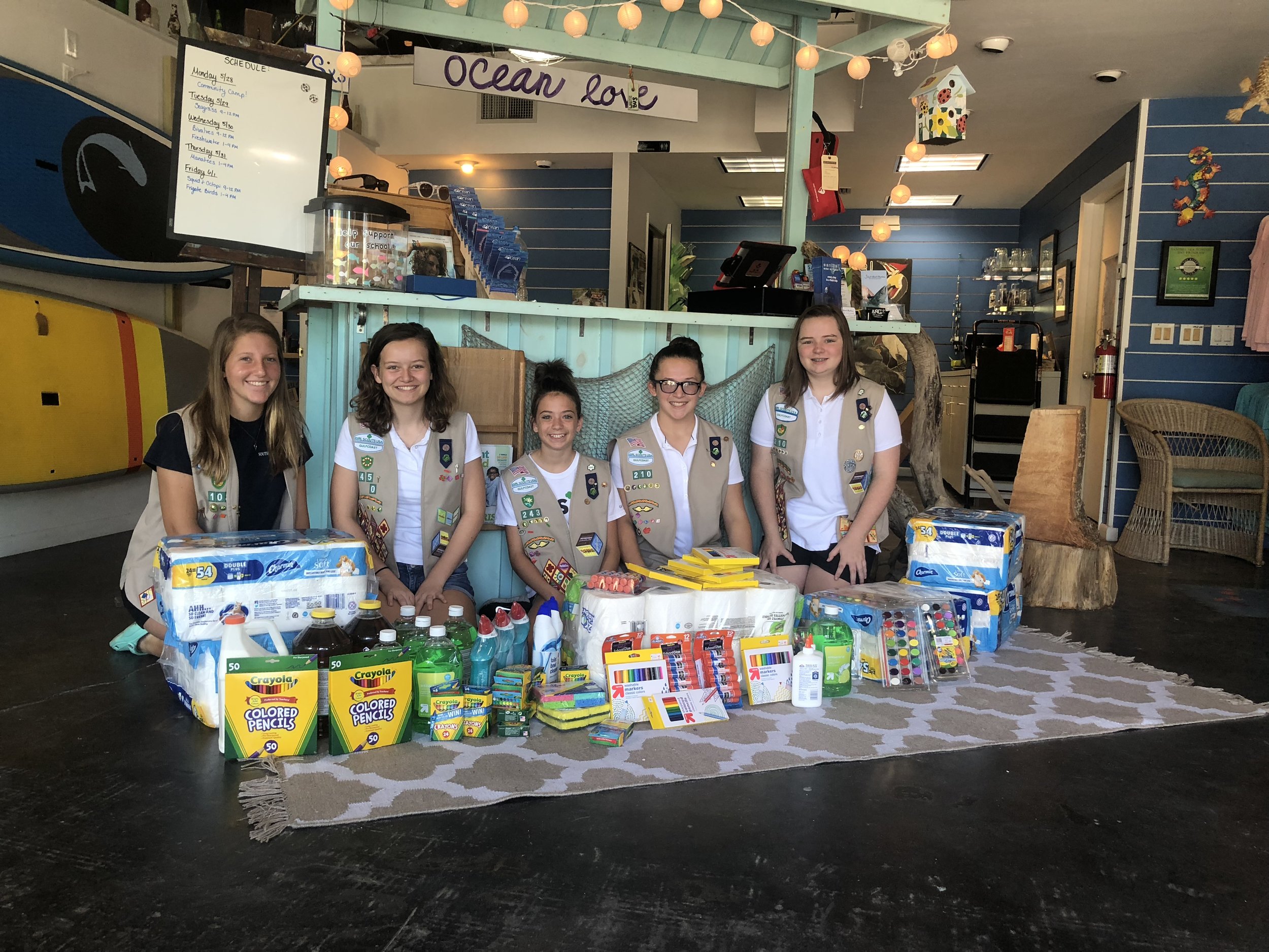 Girl Scout Troop 210 members Courtney Dingerson, Delaney Blackwell, Mia Sedorchuk, Isabella Lauzon, and Zoe Sedorchuk delivered a donation of supplies to Sanibel Sea School. 