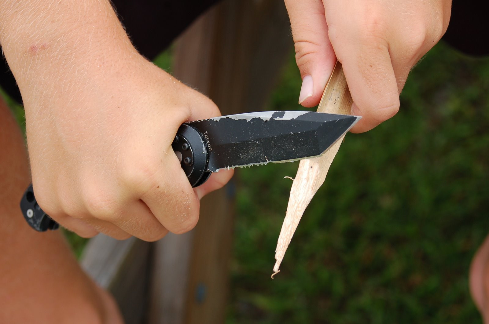 Whittling is a favorite creative pastime among campers.