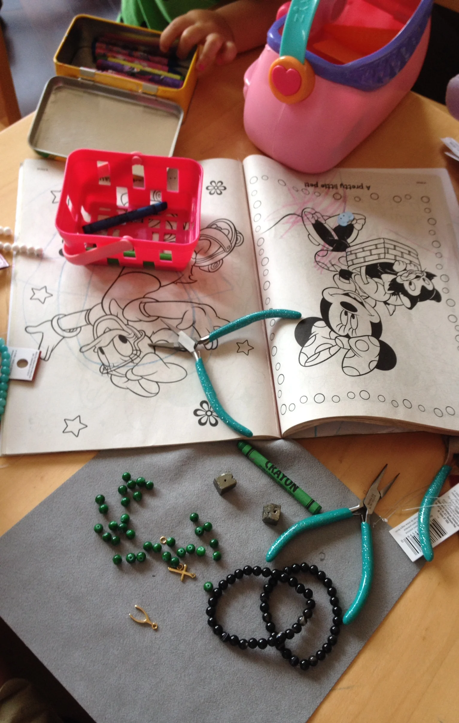 A Minnie Mouse coloring book, beads, charms, and crayons. Sounds like a party to me! 