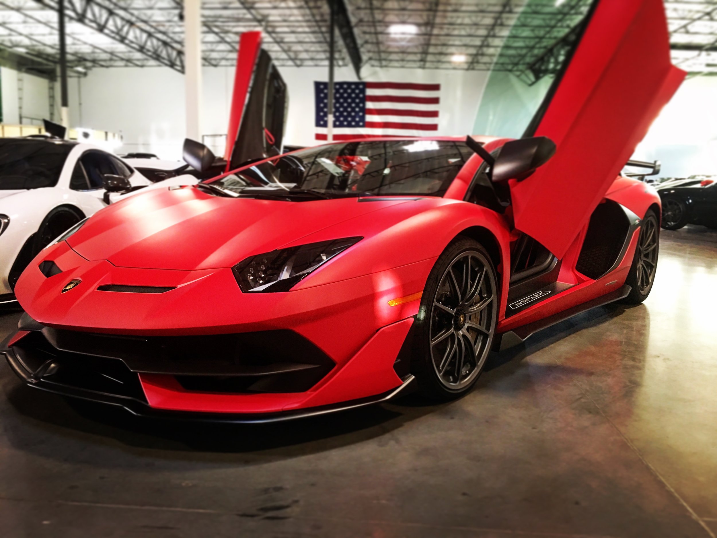 Red Lamborghini Aventador SVJ.JPG