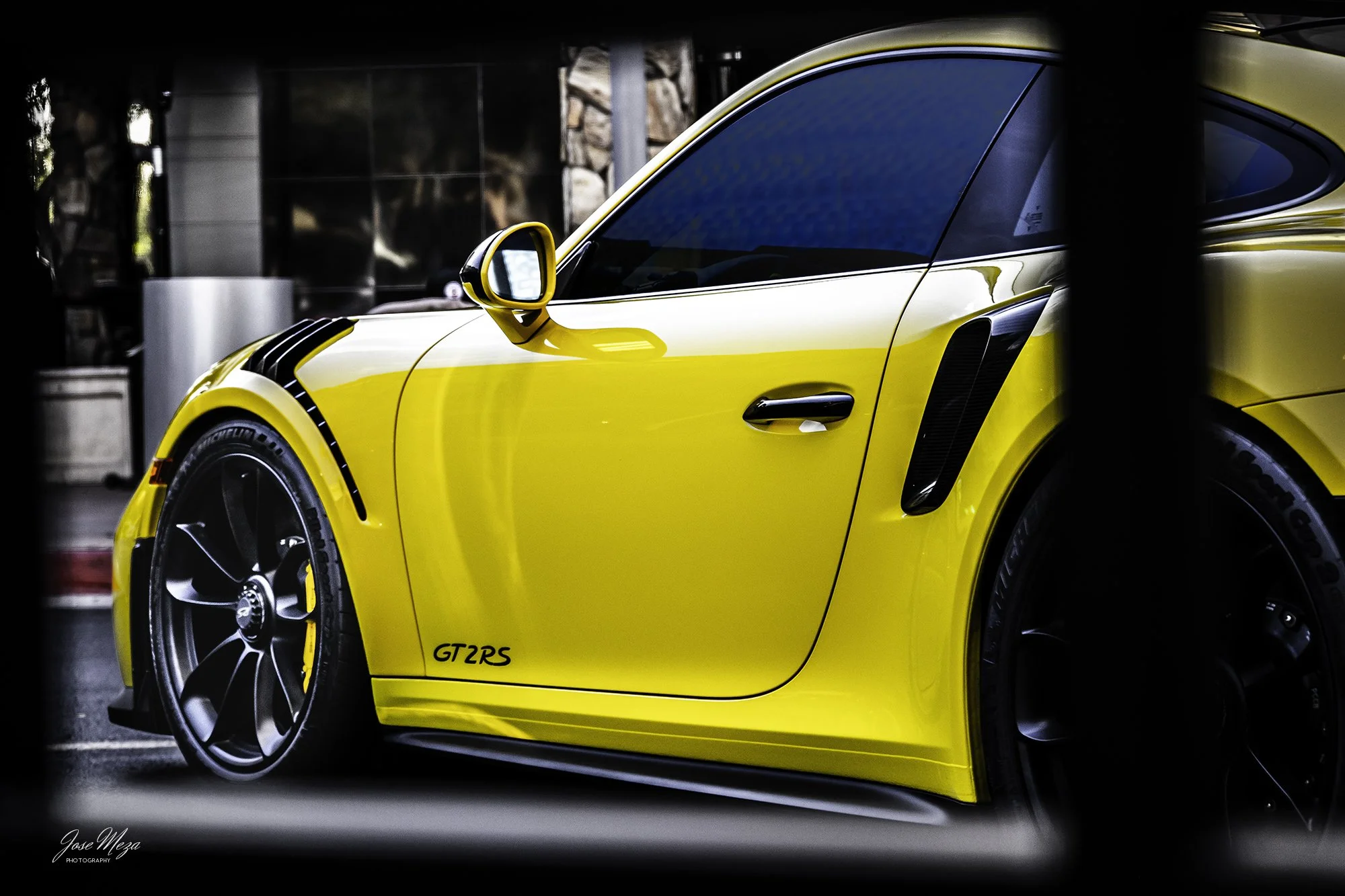 Porsche GT2RS_Yellow Black_Rear Side_Forground.jpg
