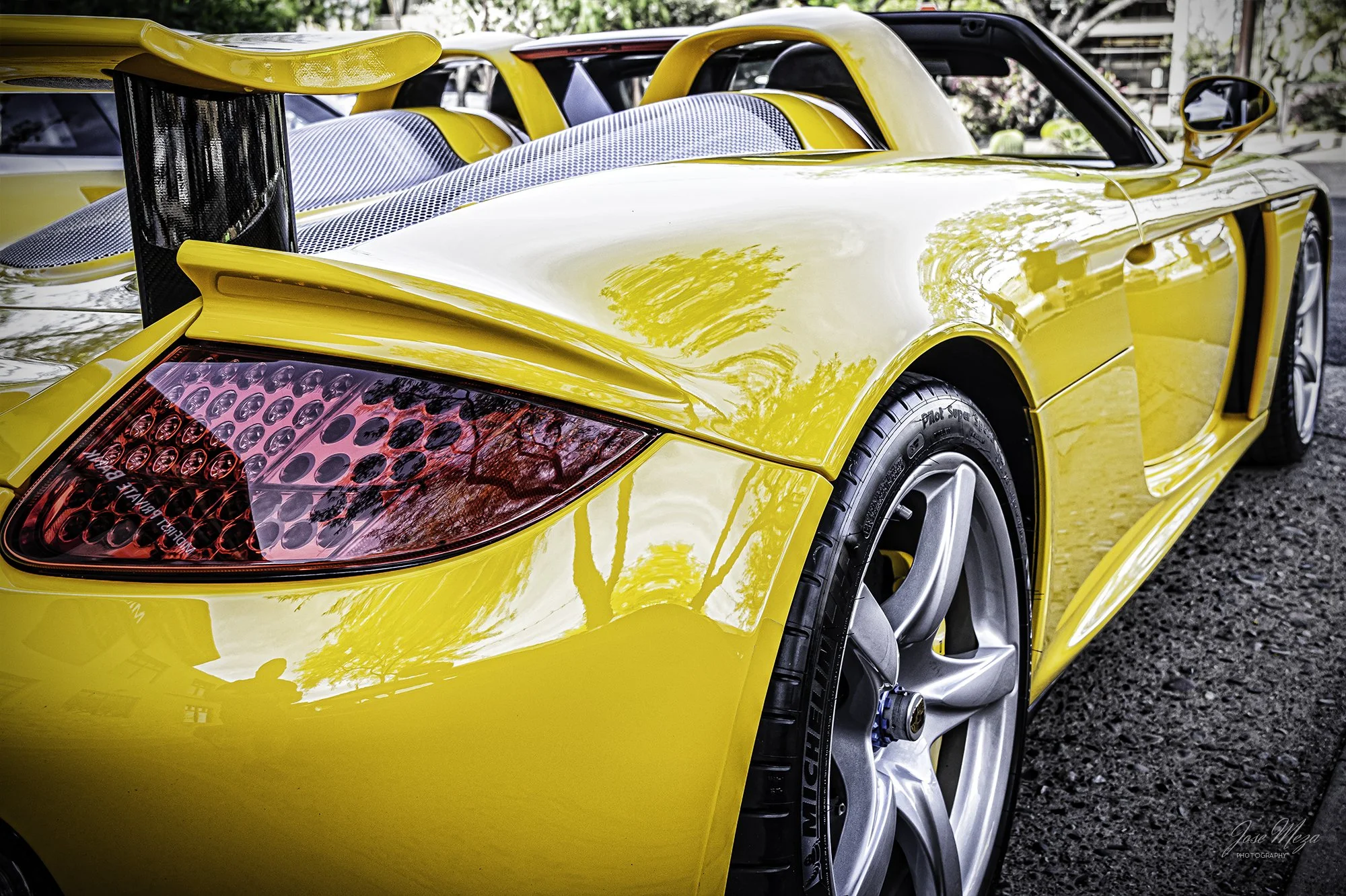 Porsche Carrera GT_Yellow_Rear Qtr View.jpg
