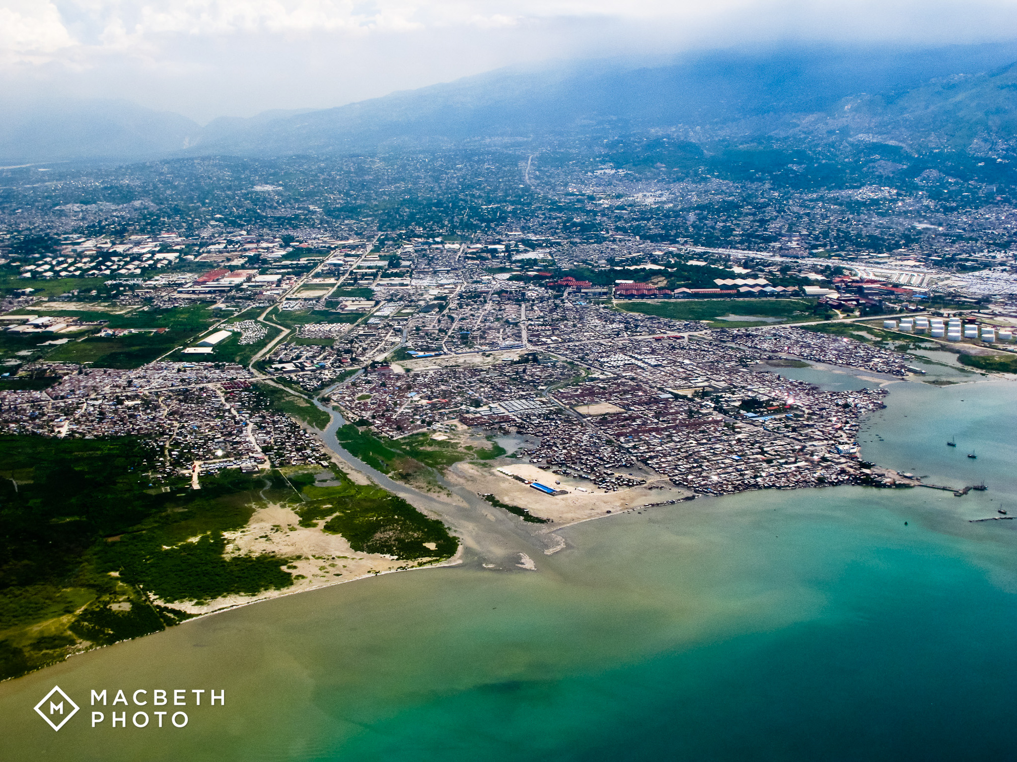 Flying in, Jim shot this aerial image of Port au Prince. This is a largely crowded area in the center of Cite Solie, considered the poorest "slum" in the city. 