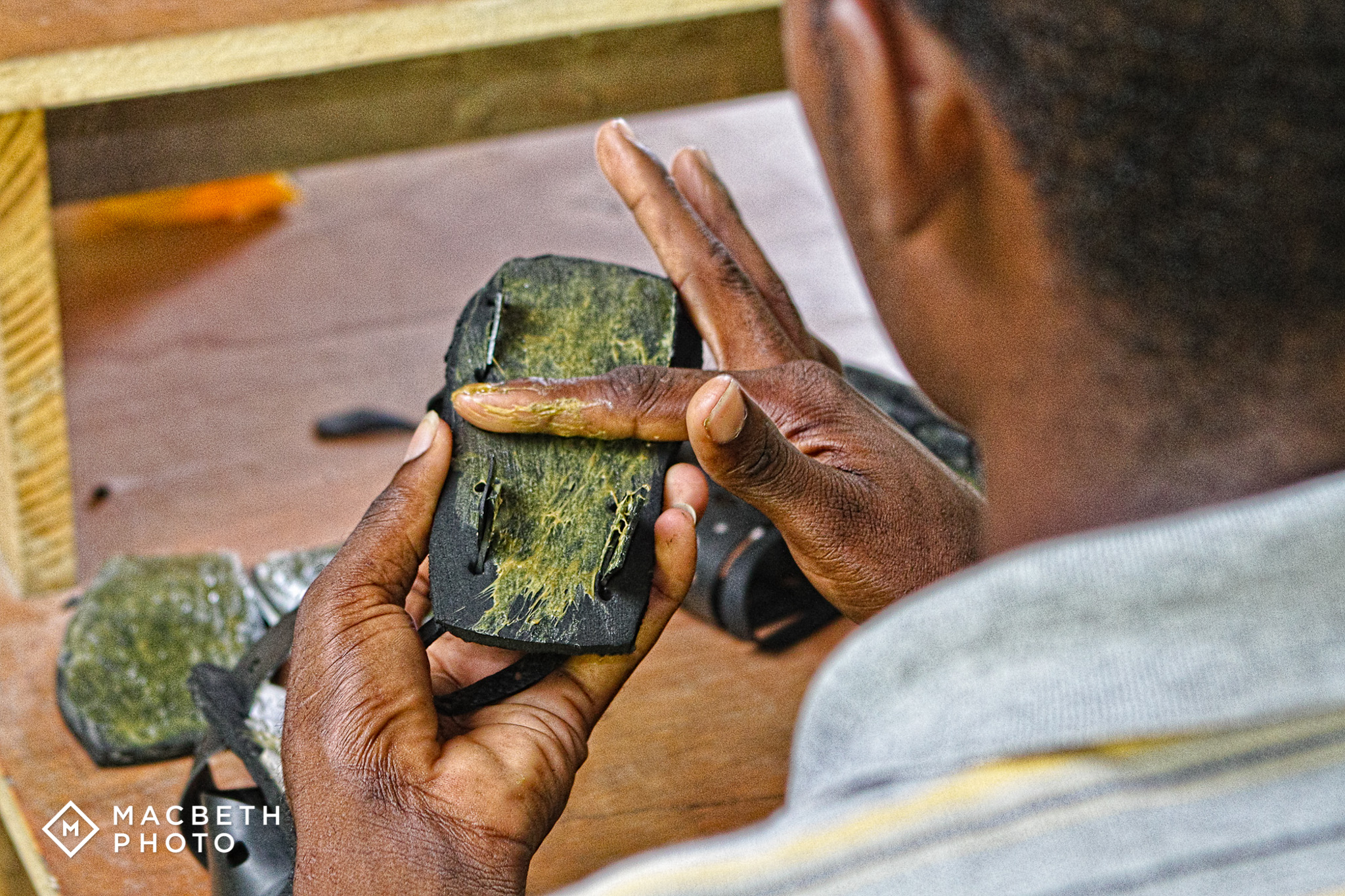 Reggie making sandals for the orphans at the workshop. Julie tells us this process has changed dramatically. We will capture the new process and report back!