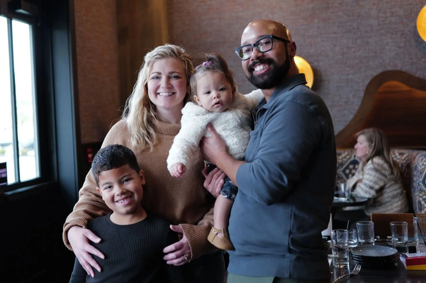Joel Levi with his wife and children.