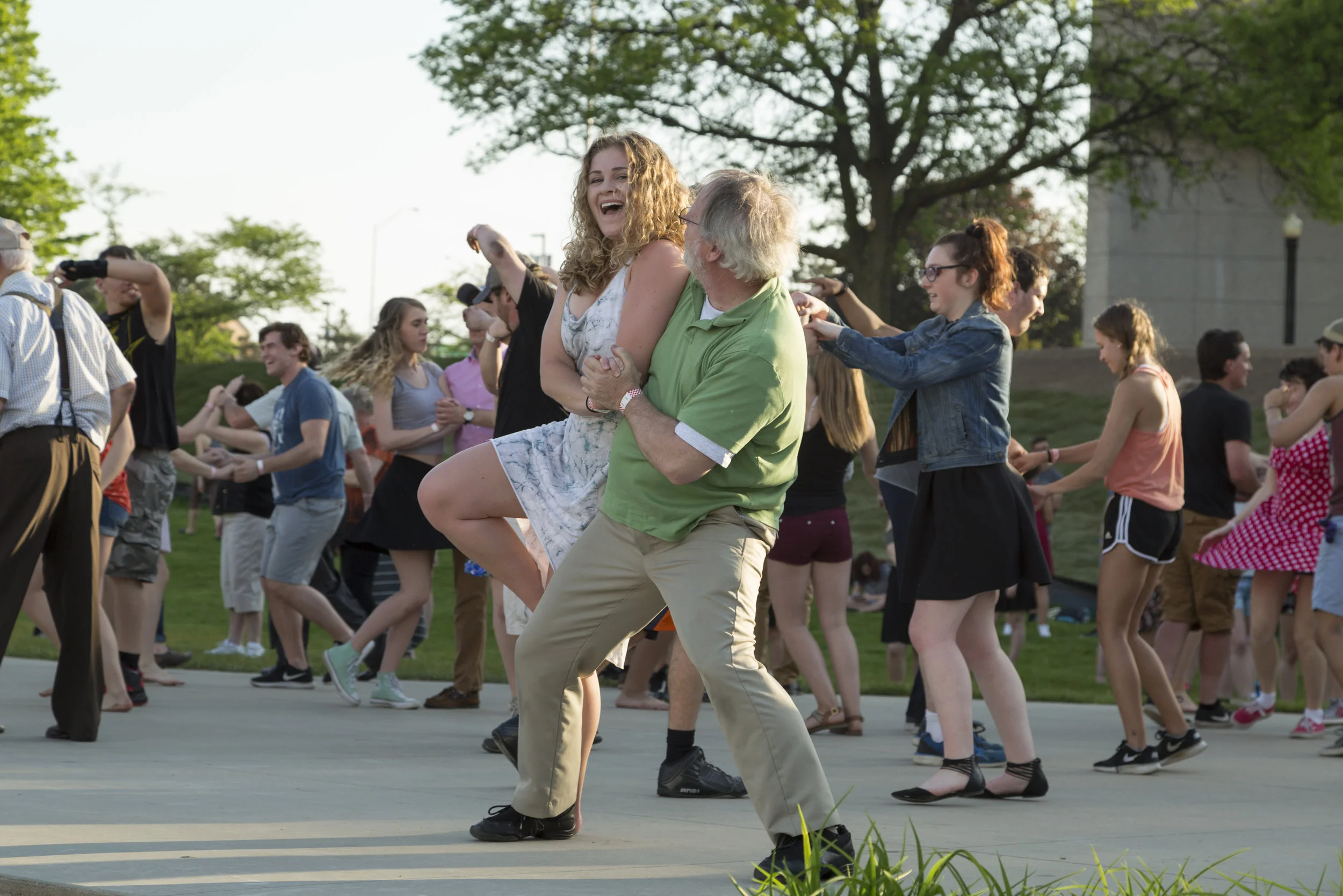 Couple swing dancing at Ah-Nab-Awen Park