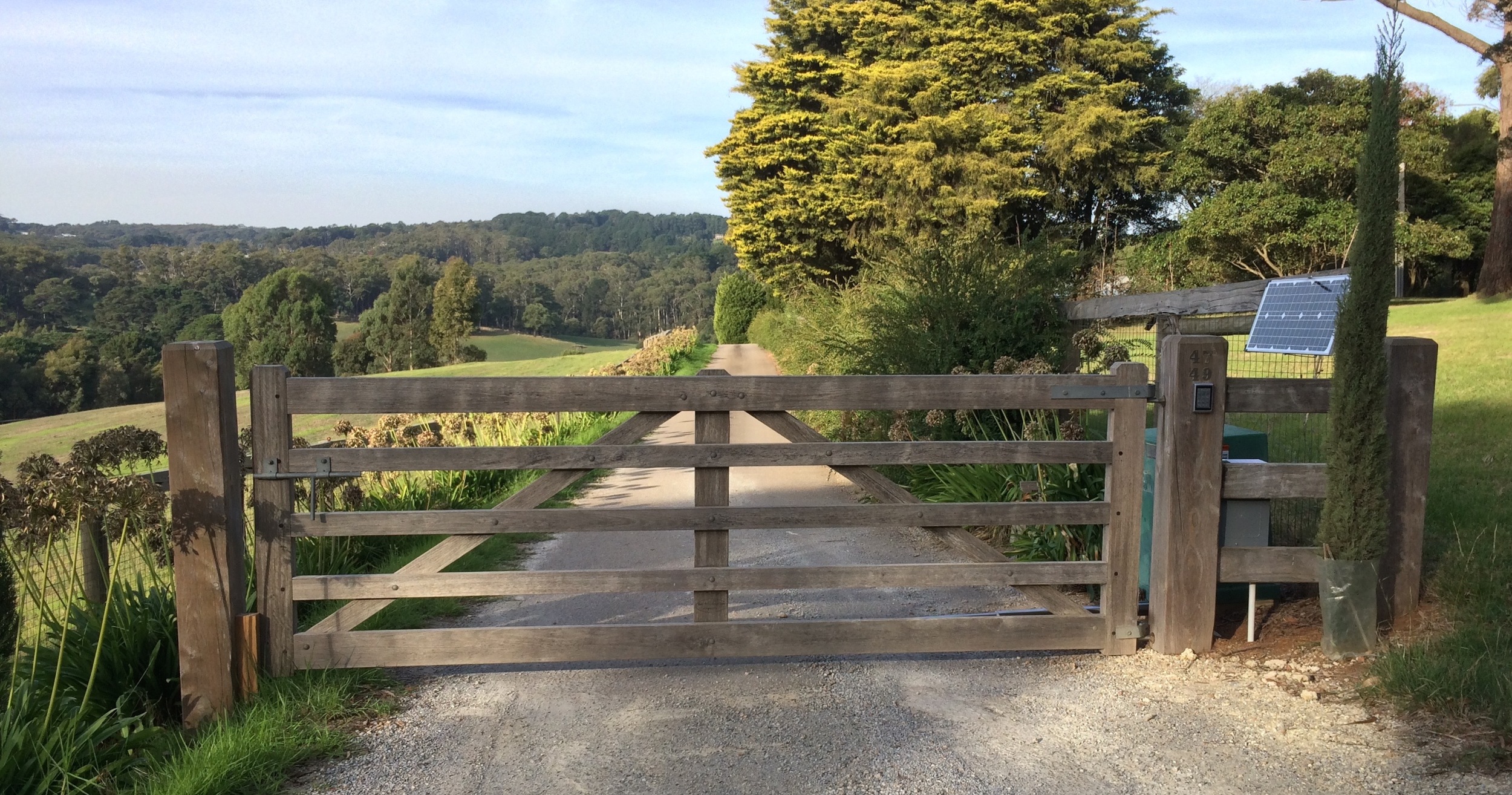 Solor gate opener Peninsula Timber Gates.jpg