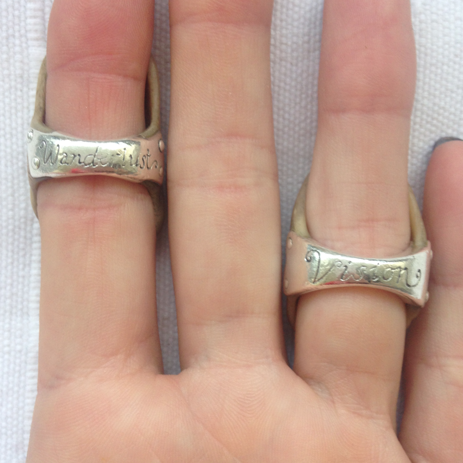 To reinforce my travel buddies for adventure I went to my incredible friend Steph Lusted who set them in silver and engraved the words 'Wanderlust' and 'Vision' upon them. Both make me smile with their jolly expressions ^+^