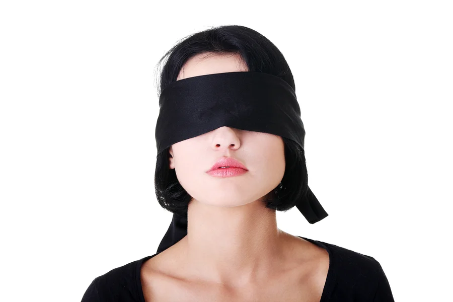 portrait-of-a-young-woman-blindfolded.jpg