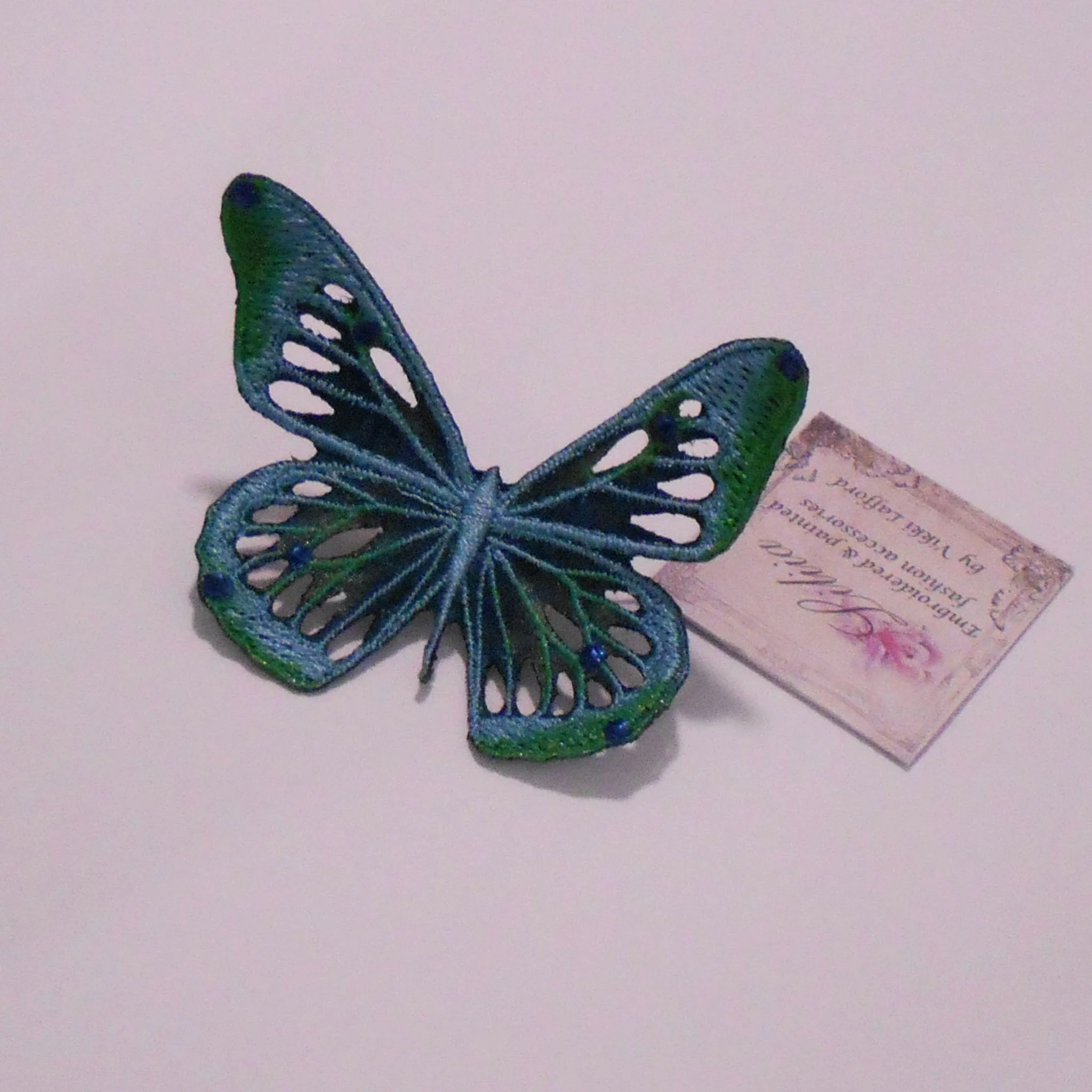 Small Skeletal Butterfly Green Web.jpg