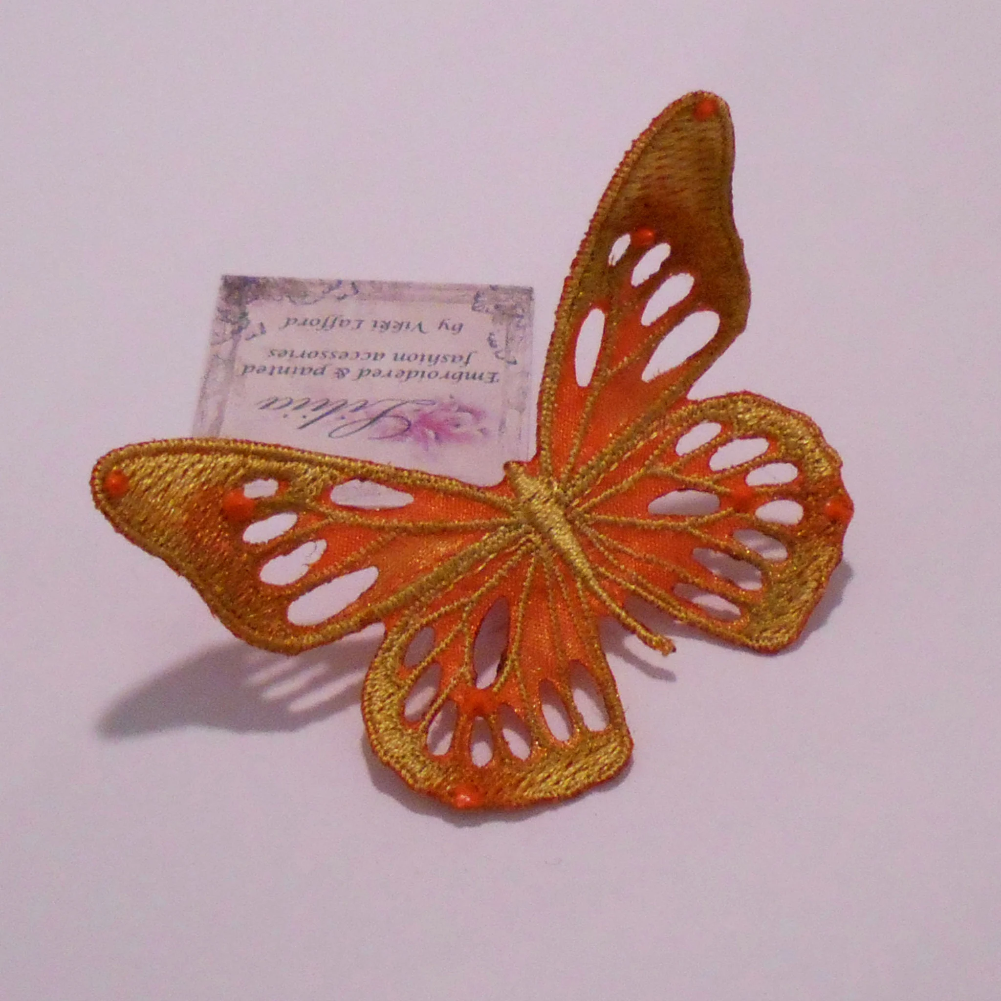 Small Skeletal Butterfly Orange Web.jpg