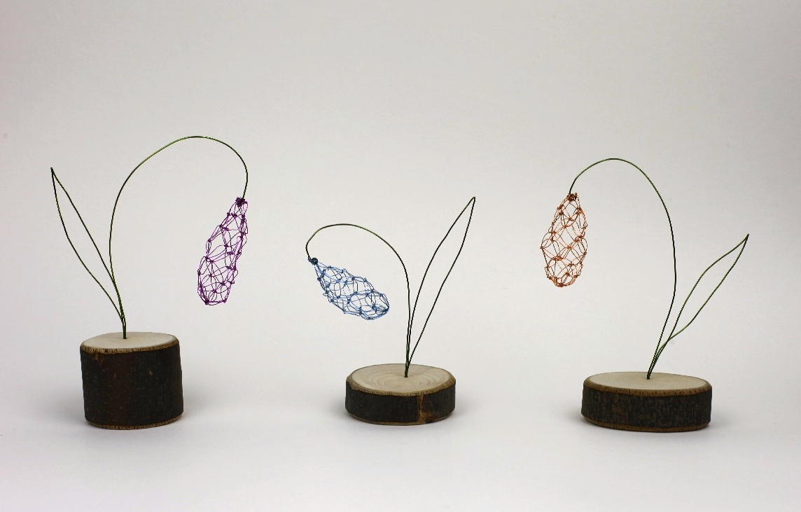 Snowdrops copper wire on wooden plinths