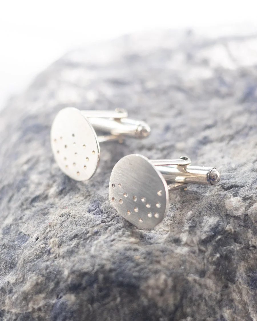 One of our featured jewellers currently in our window display is Claire Lowe. Her pebble collection is handcrafted from a combination of brushed silver, matt grey resin and frosted glass beads. Inspired by one of her local beaches, Claire loves the p