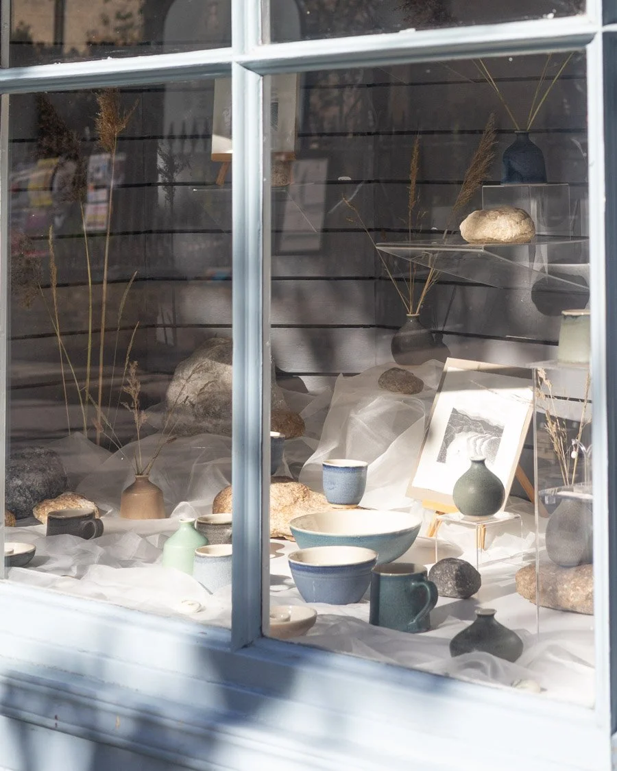 We've been enjoying how the autumnal light hits our window display which features the ceramics of Emily Tapp and prints by Jay Caskie. We love how this display creates a calming coastal look in line with both artists work inspired by the sea! 

You c