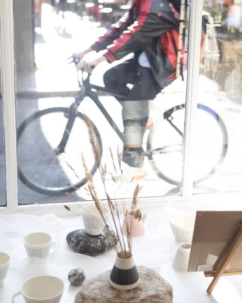 There's not long left to see our current coastal inspired window display! With rocks, dried plants and material that gives a seafoam effect, this display feels like the UK coast and pairs perfectly with our featured artists Emily Tapp, Vicky Hagman, 