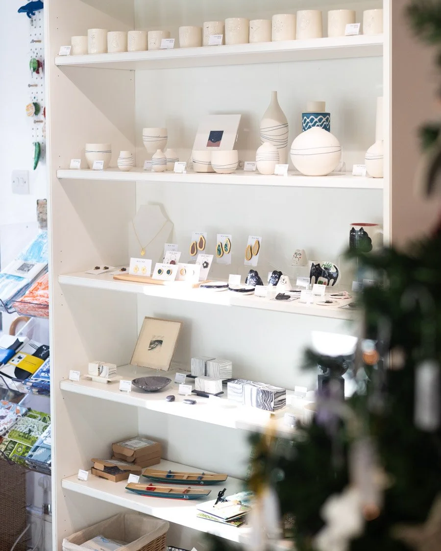 Here are our shelves at the front of our gallery featuring so many beautiful small scale pieces from functional to decorative. 

Artists from top shelf down: 
Tealights by Luna Lighting
Ceramics by Yael Rosenberg, print by Hannah Bigley
Jewellery by 
