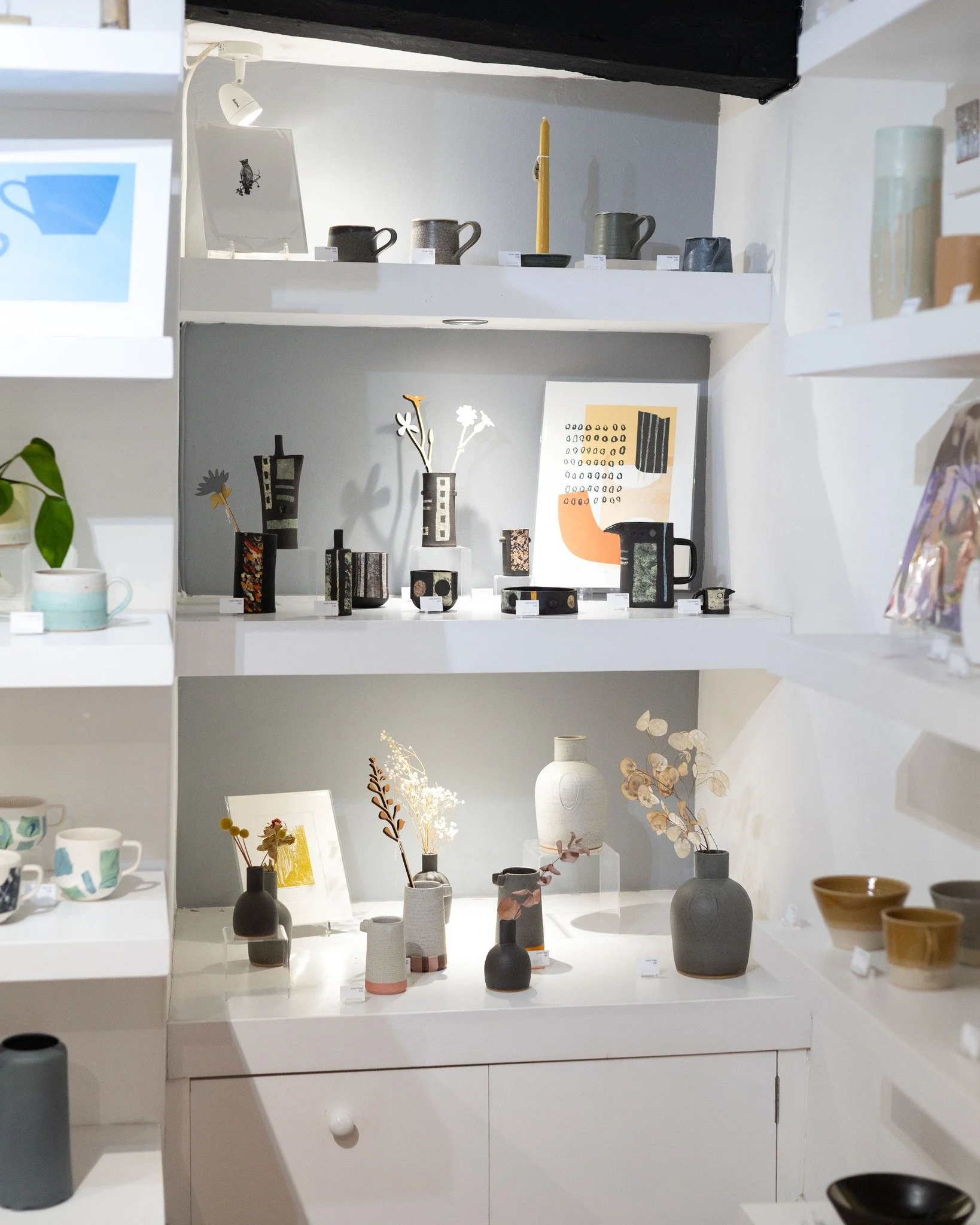 Our displays are topped up with a new delivery from Judy Adams (ceramics on the middle shelf) who's bold designs have a wonderful matte textured finish. We love the balance of shapes and subtle use of colour in her pieces. Pop by the gallery for a co
