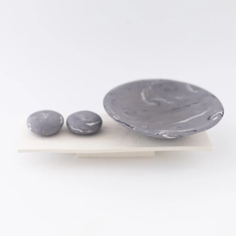 Wide Rocking Bowl and 2 Pebbles on Burnt Porcelain Plinth by Kim Colebrook