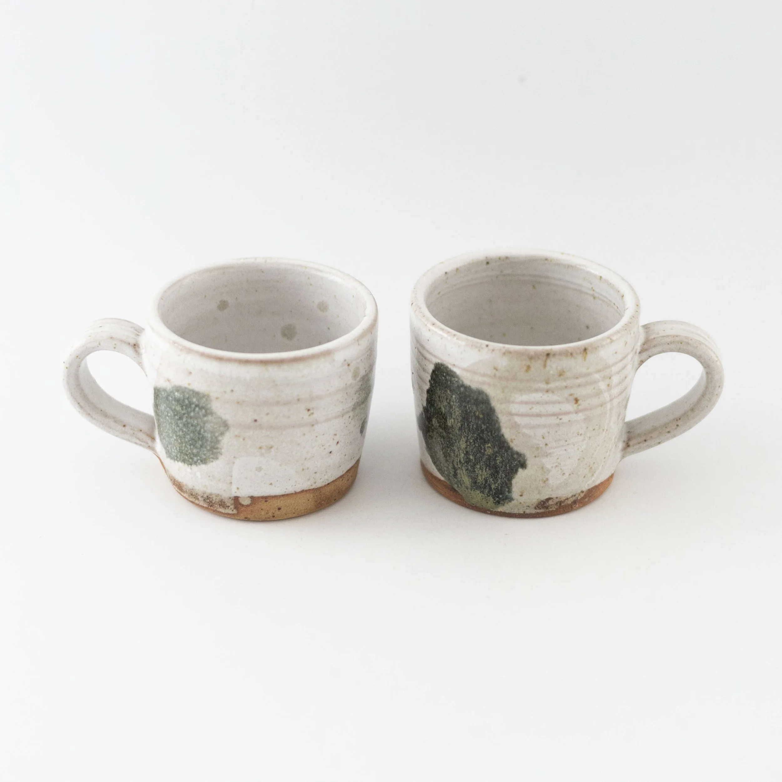 Black Brush Espresso Cup with Dolomite and Wood Ash Glaze by Rachel Gray
