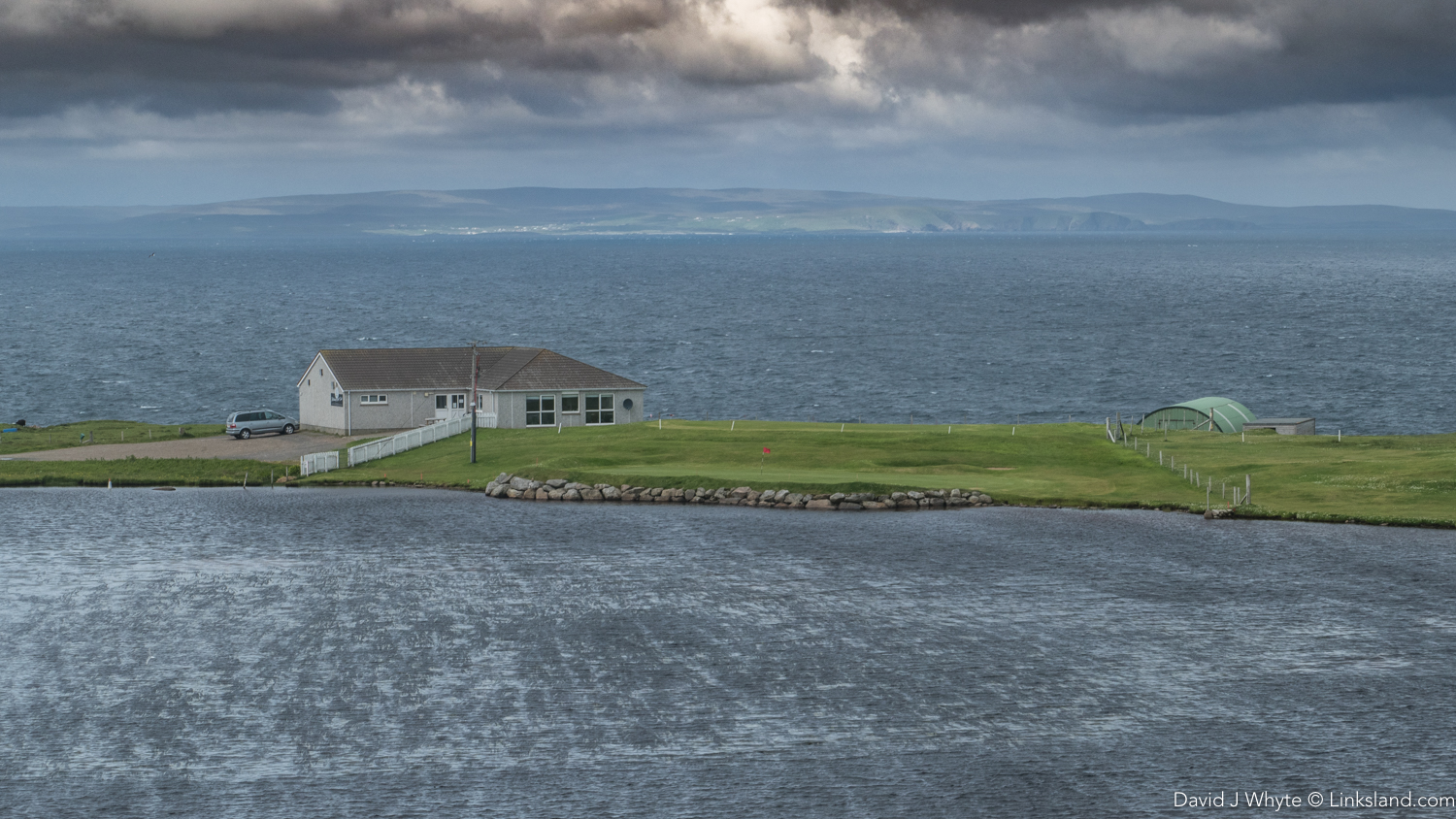 The 18th at Whalsay sits behind a loch with the North Sea surrounding the golf course.