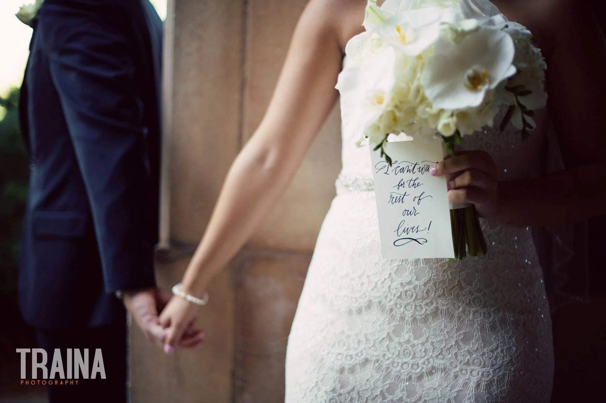 Photo Courtesy of Traina Photography ~ Wedding Planner: The Wedding Belle ~ Calligraphy: Inkstainedfingers