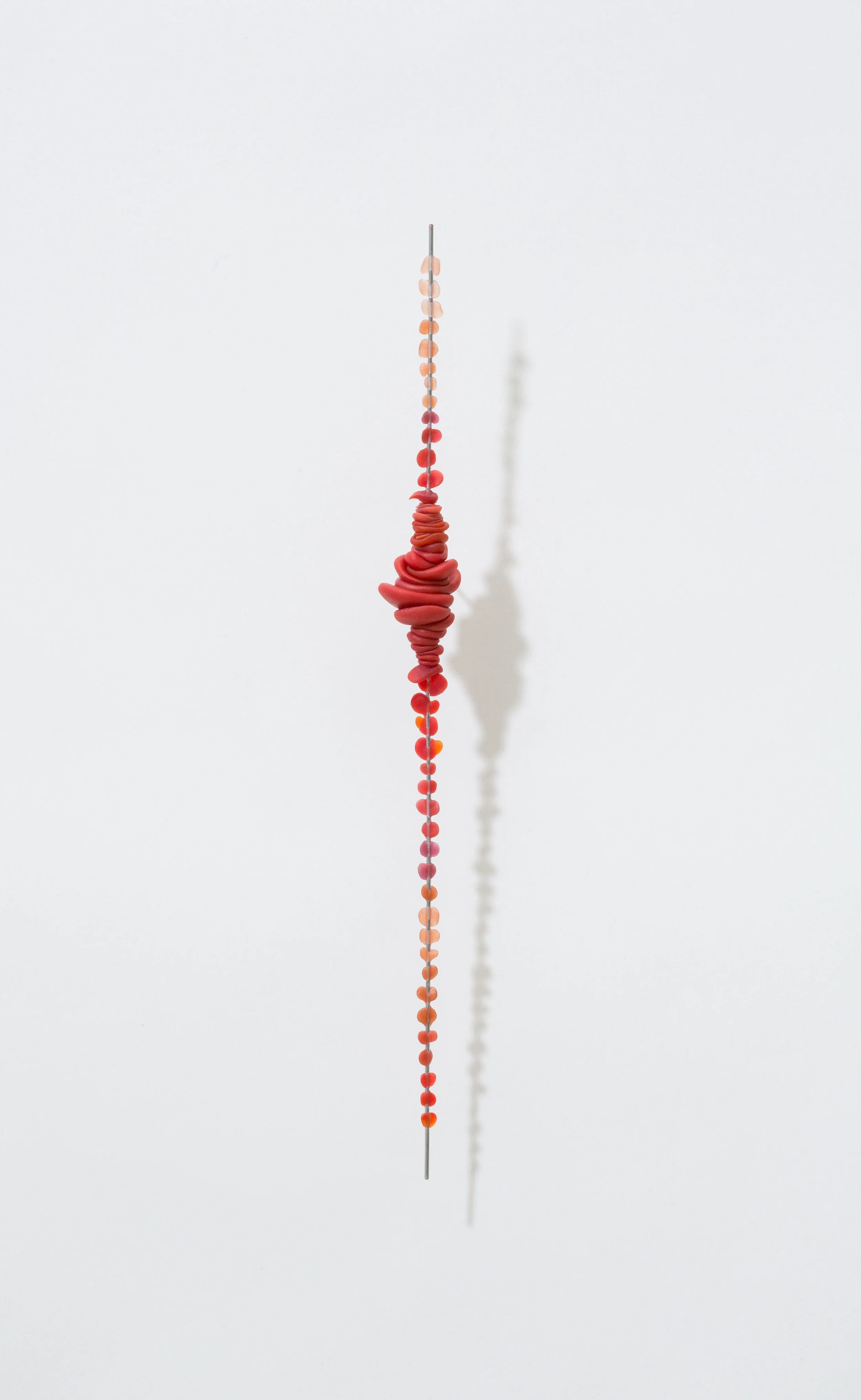  Cinnabar 2015 | polymer, ink, aluminum rod  12’ X 1” X 1” 