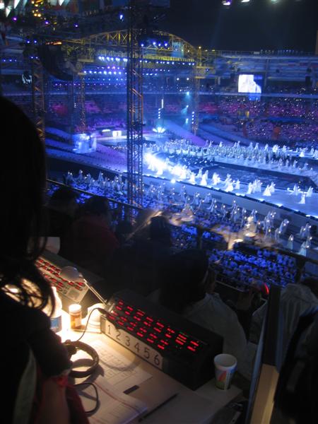 View of the stage from the comms control room. Note the Riedel DSP desk panels labeled 1-6 for access to the six in ear monitor systems.