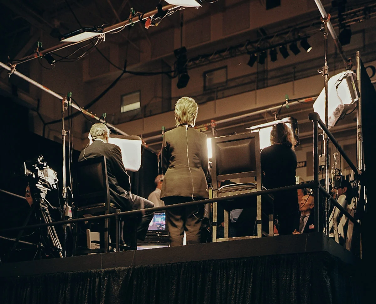 The media interviews after the debate. Photo by Harlan Erskine. 