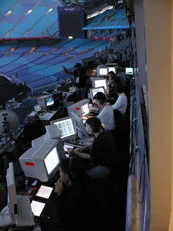 Lighting consoles at night using four Clear-Com ICS-92 intercom stations.