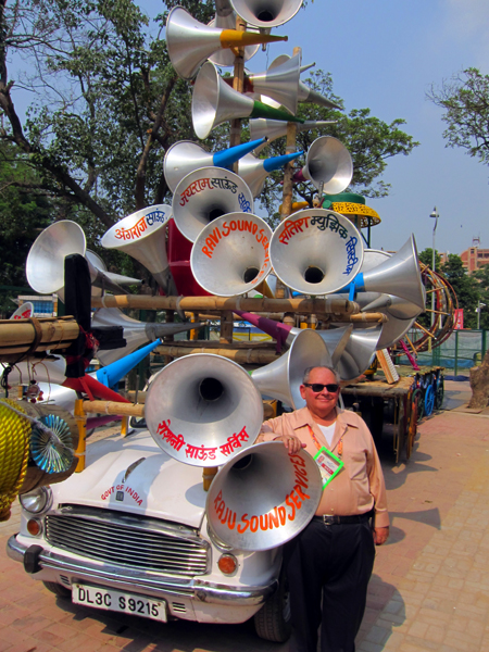 Larry Estrin with show PA system. It's amazing what a few horns can do if mobile enough.