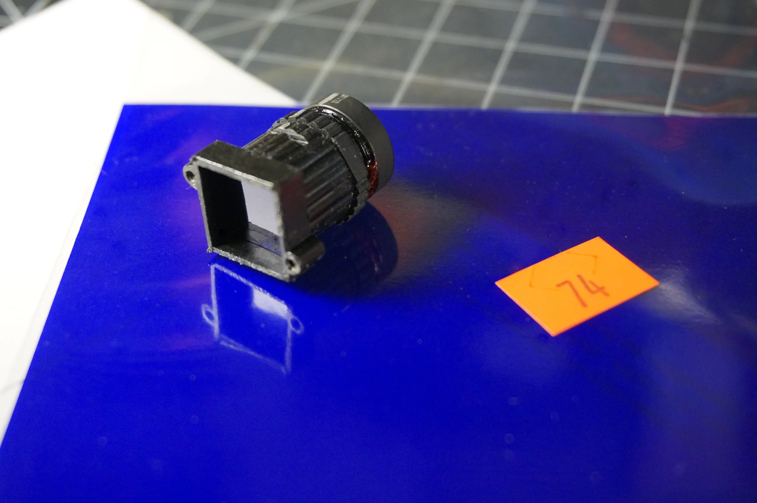 The #74 ultra-blue filter replaces the infrared blocking filter in the back of the lens holder.