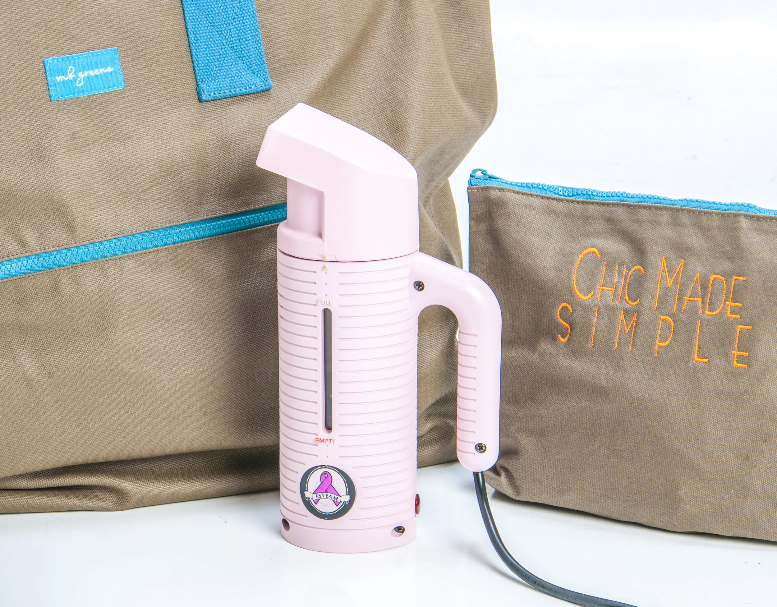 Jiffy Steamer E-Steam Personal Handheld Steamer, purchase here ; Canvas bags by Fairhope-based MB Greene (Marguerite’s Conceits, $76 & $28). 