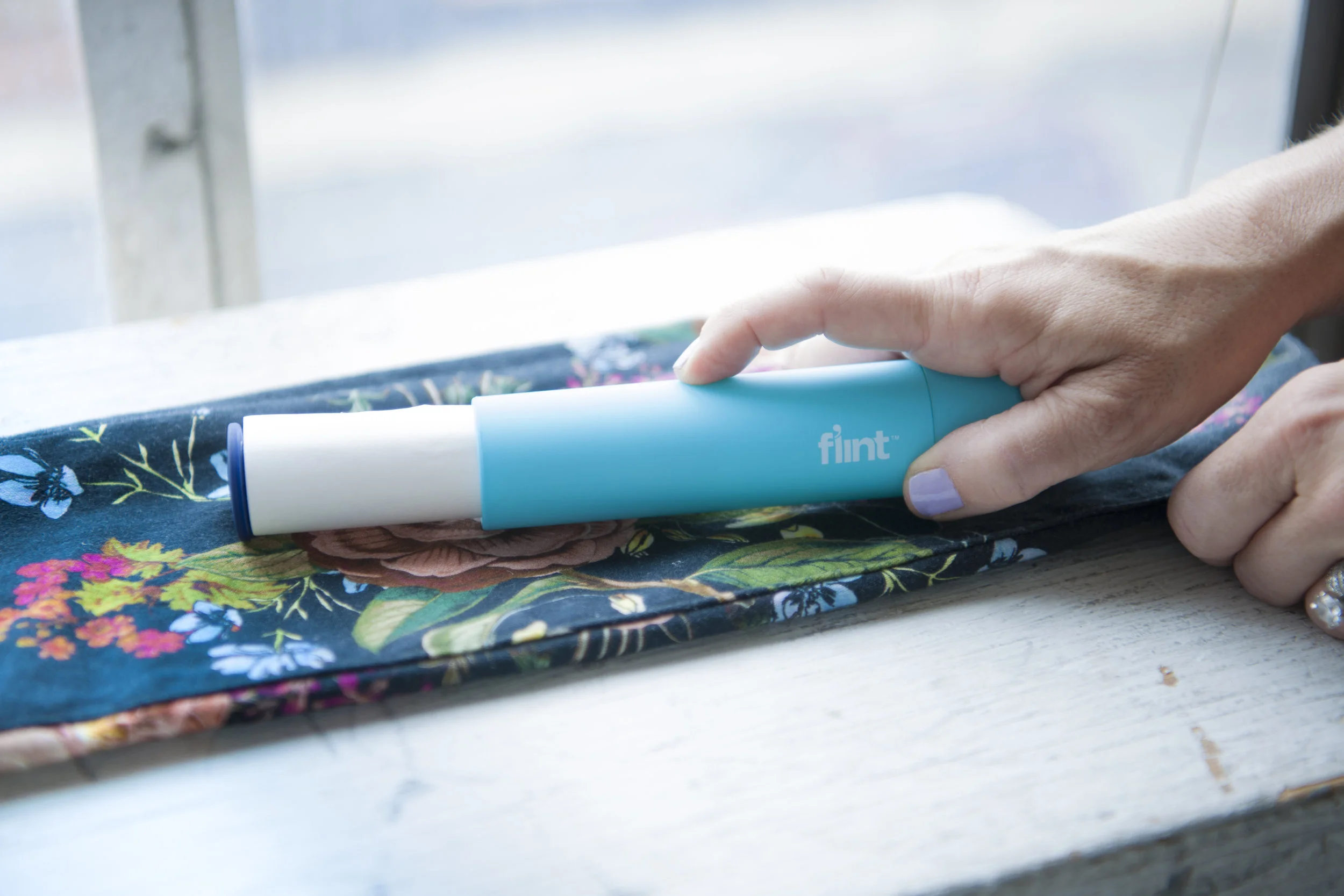 F'lint Travel Lint Roller, purchase here ; 7 for All Mankind The Ankle Skinny Jean in English Botanical Print, ($199, Belk).