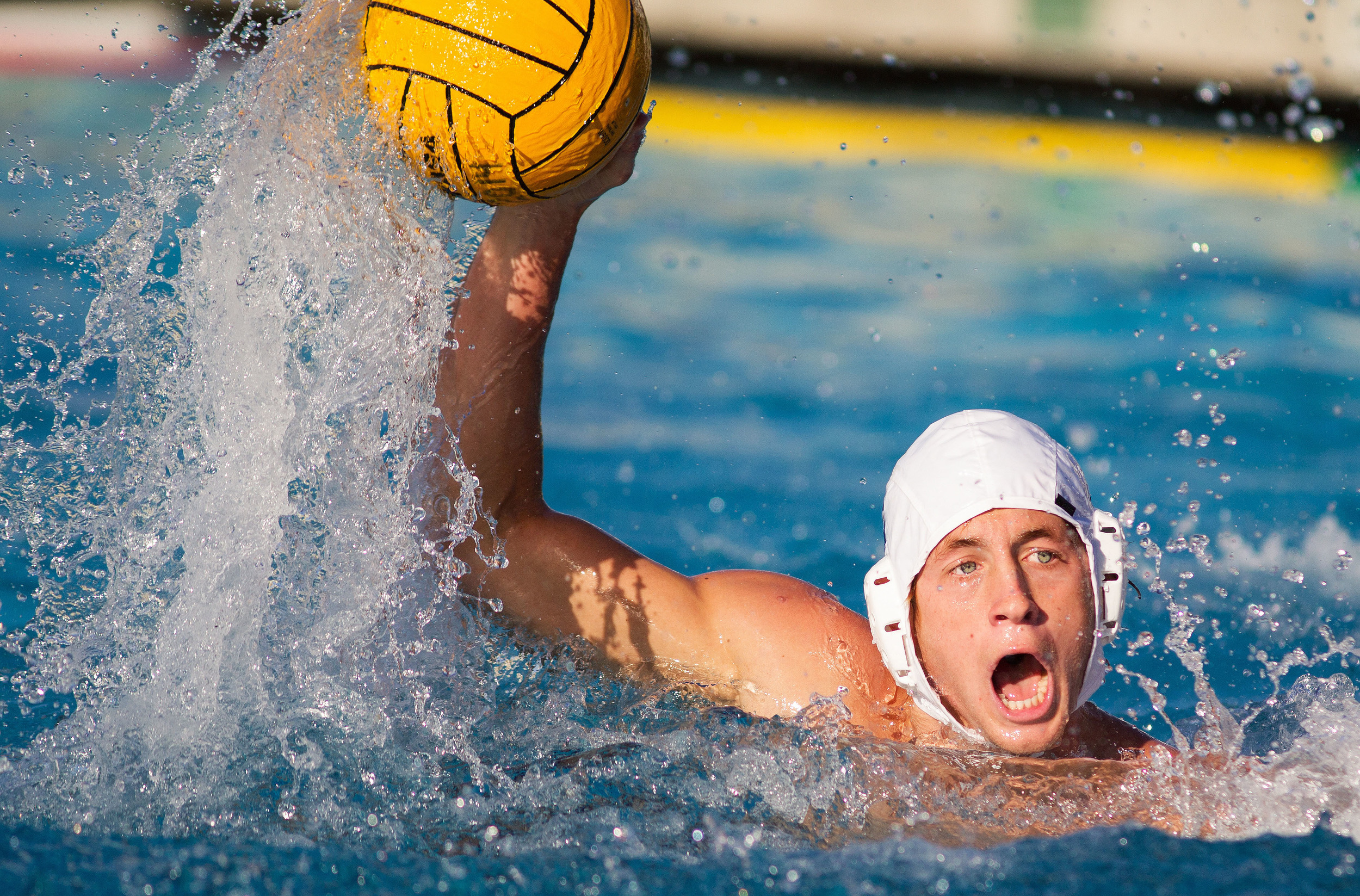 A Riverside men's water polo player looks to pass during a game against Golden West College at Golden West College.