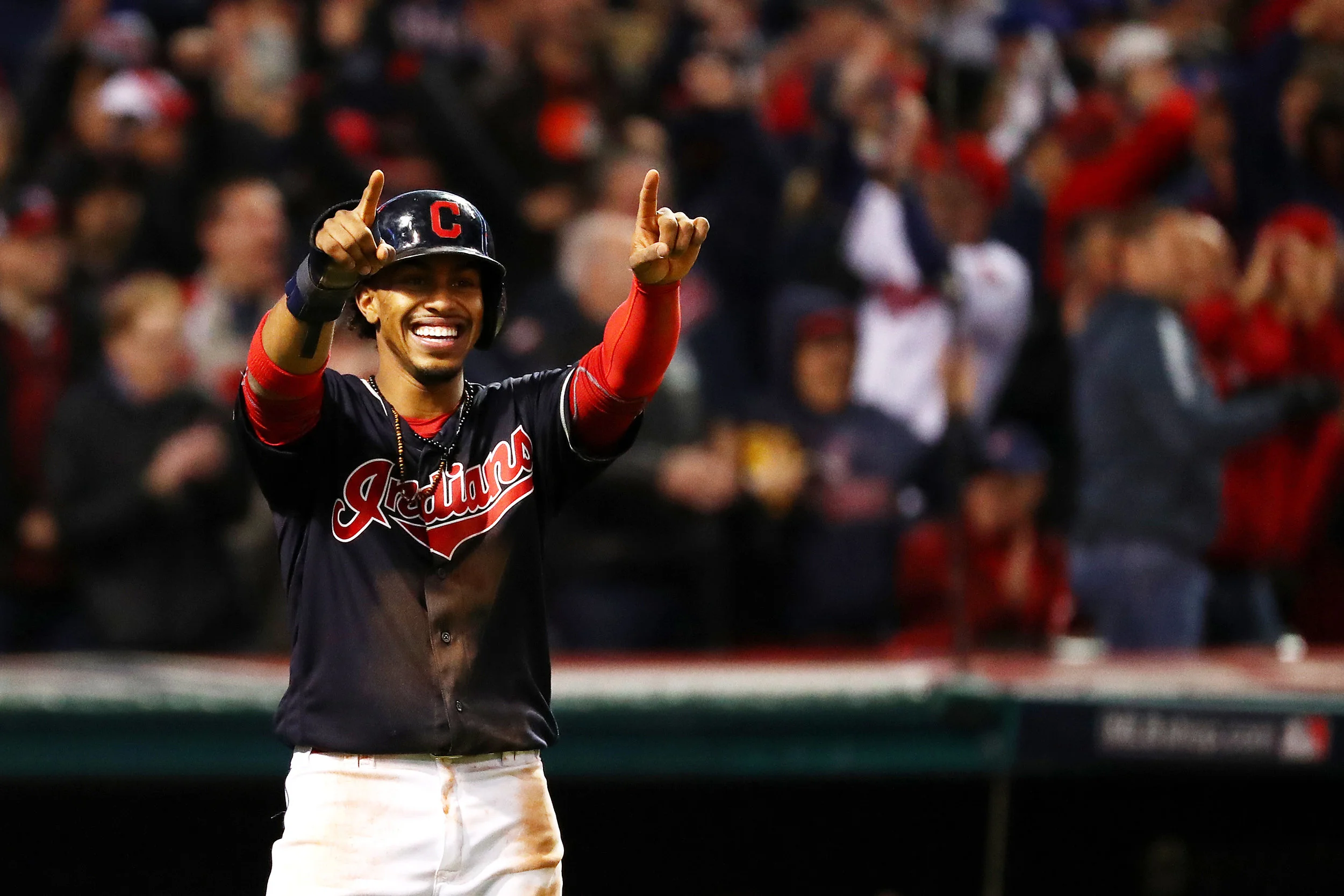 CLEVELAND, OH - OCTOBER 25: Francisco Lindor #12 of the Cleveland Indians celebrates after scoring a run during the first inning against the Chicago Cubs in Game One of the 2016 World Series at Progressive Field on October 25, 2016 in Cleveland, Ohio. (Photo by Tim Bradbury/Getty Images)
