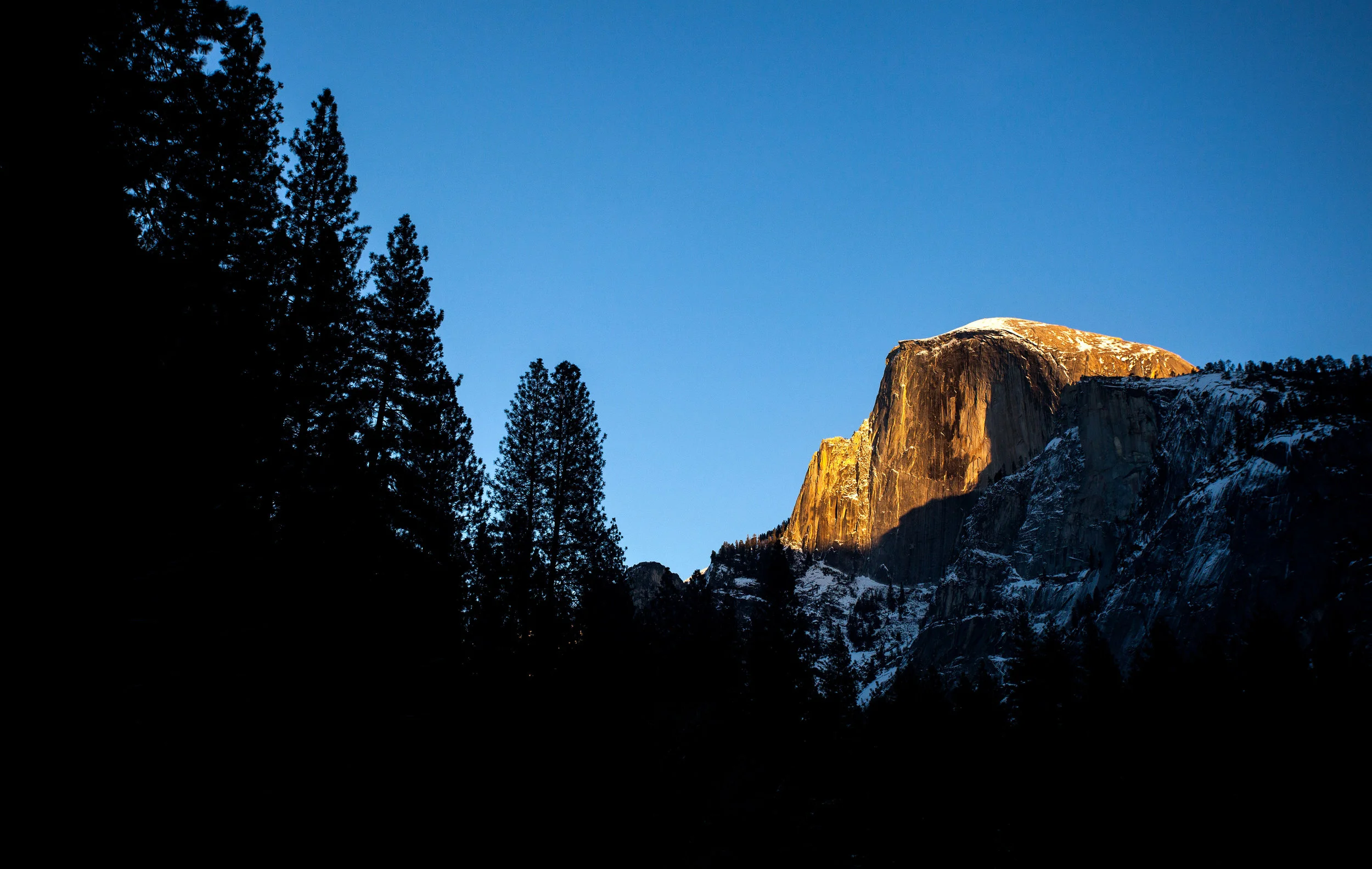 YOSEMITE, CA - DECEMBER 28: Half Dome is seen during sunset at the eastern end of Yosemite Valley on December 28, 2016 in Yosemite National Park, California. (Photo by Tim Bradbury/Copyright 2017)