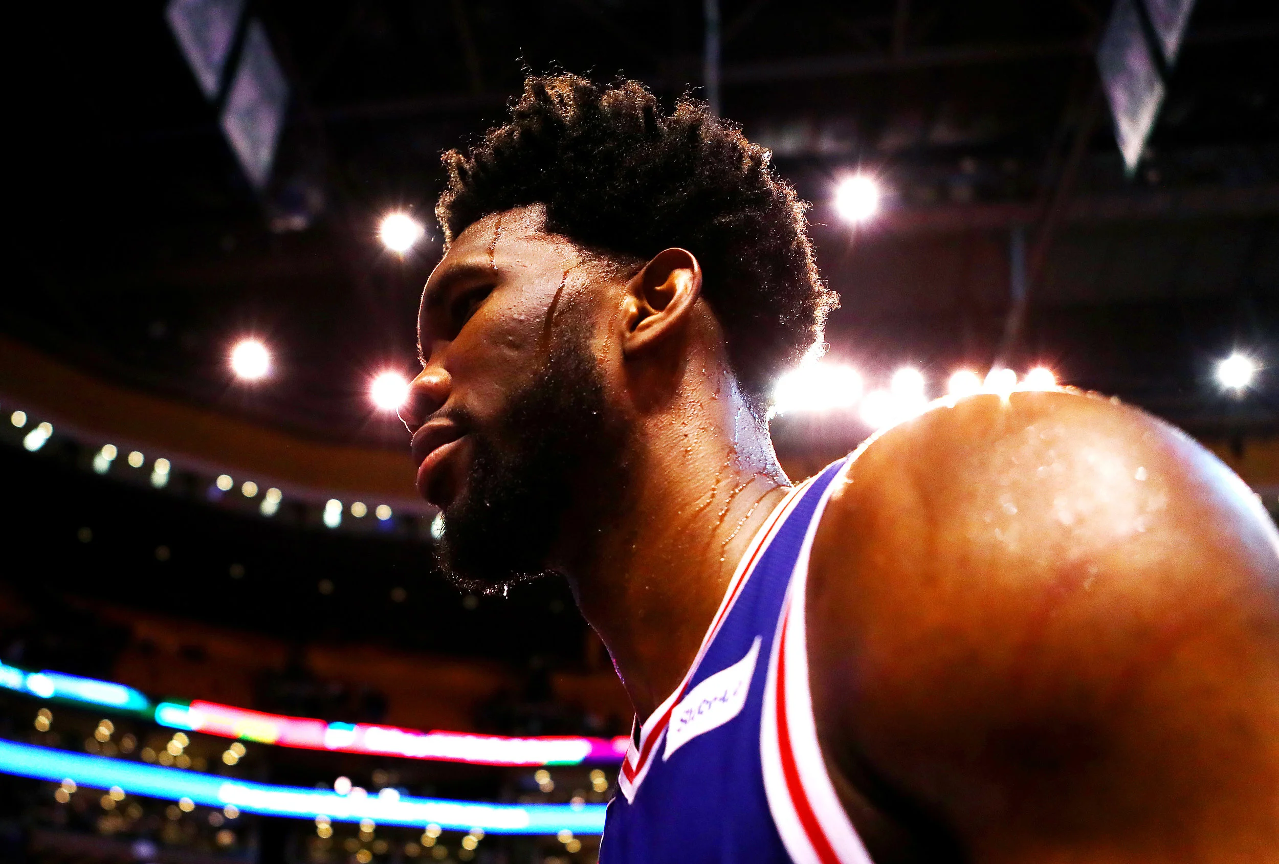 BOSTON, MA - JANUARY 18: Joel Embiid #21 of the Philadelphia 76ers walks off the court after defeating the Boston Celtics 89-80 at TD Garden on January 18, 2018 in Boston, Massachusetts. (Photo by Tim Bradbury/Getty Images)