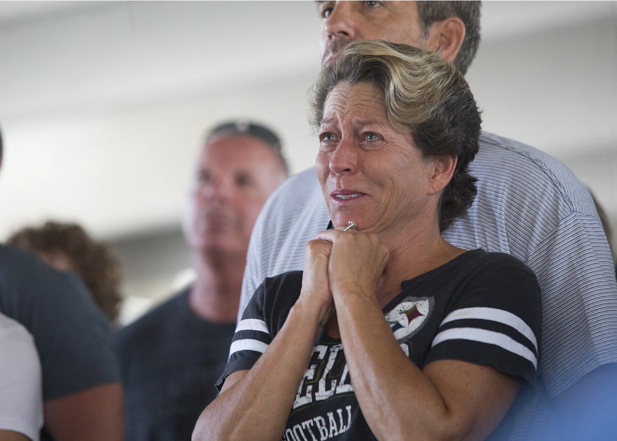  Parishioners cry during the first service at First Baptist Church in downtown Panama City, Florida since Hurricane Michael on Sunday, October 14, 2018.  