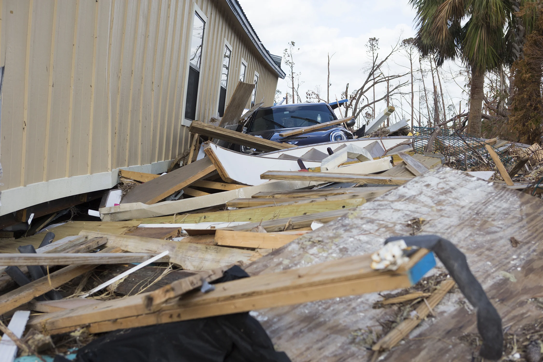  A Mini Cooper that somehow appeared behind the police station in Mexico Beach, Florida on Friday, October 26, 2018. There was no where to park a car behind the police station before the storm and police are not sure where the car came from.  