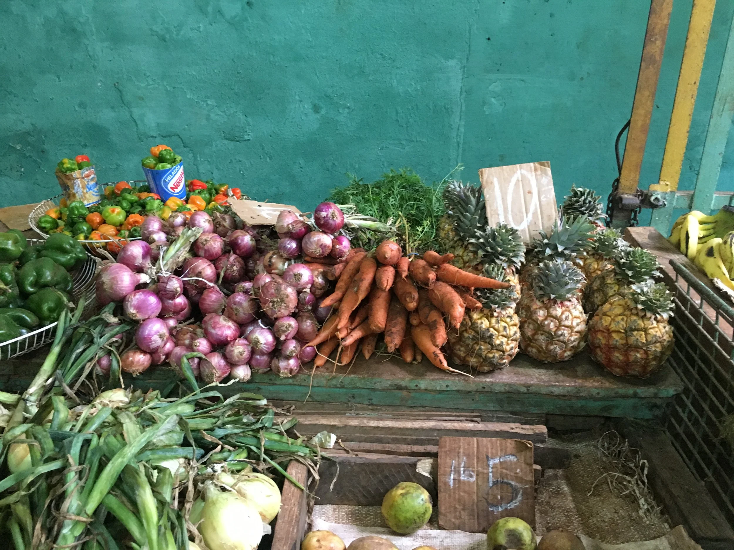 A typical veggie stand in Havana's residential neighborhoods. The carts are brought out in the morning loaded up with produce that comes in from farms located on the outskirts of the city.