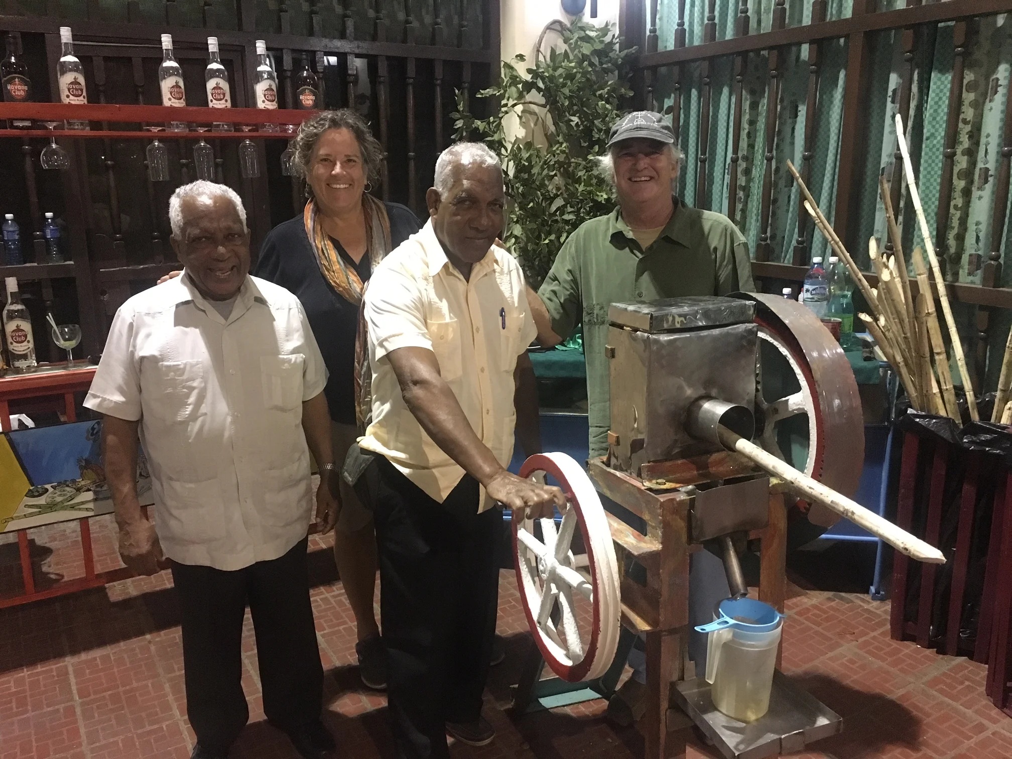 These gentlemen were anxious to share their sugarcane hand-operated press. They handed us a glass of fresh raw sugar cane juice , which was delicious, smooth and not too sweet. Then they poured a shot of rum in it and said "try it now!".