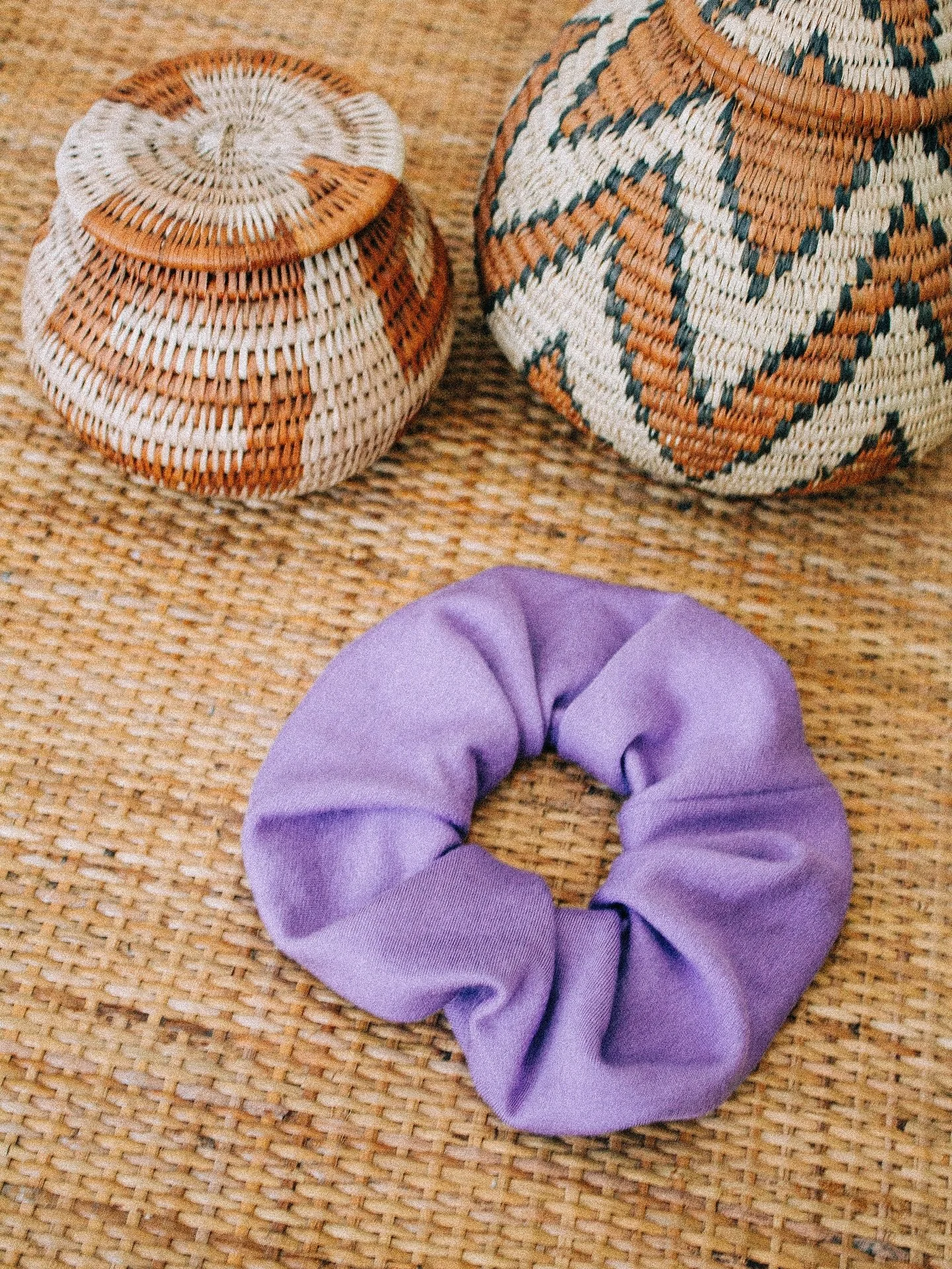When making Corinne pieces there are significant pieces of fabric leftover and I always mulled over it so to be less wasteful and use almost every piece of fabric the Lana Scrunchie was born. All of these scrunchies are made in our signature fabric, 