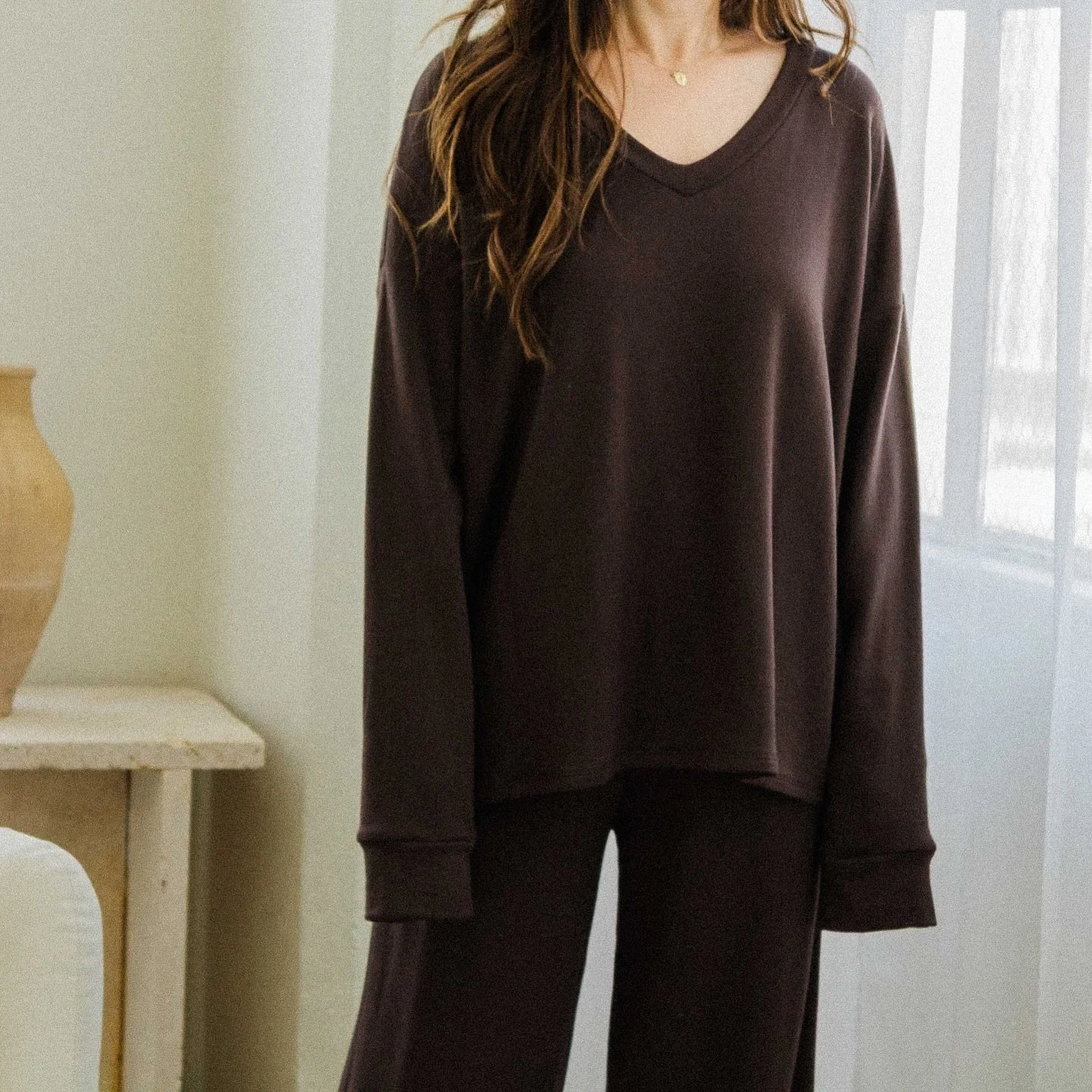 Luna V-Neck Tunic in Walnut&mdash;the top is oversized so it is recommended to size down. 🌰 #corinnecollection #fw25 #aw25
