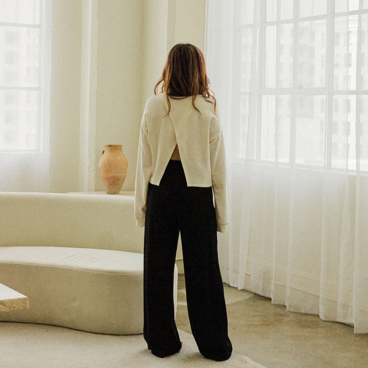 Rosie Top in Ivory and Adelyn Pant in Black. #corinnecollection #fw25 #aw25