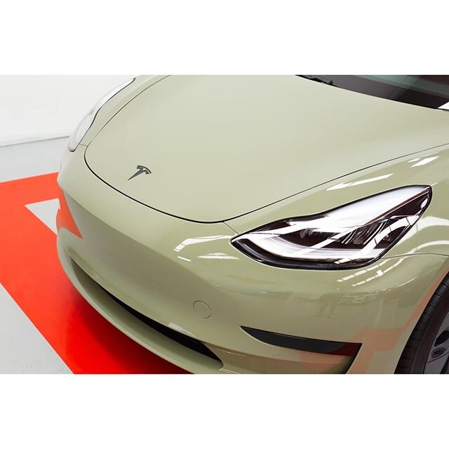 Tesla Model 3 wrapped in super gloss Khaki Green 🏁🏁 #thewrapshop #paintisdead
