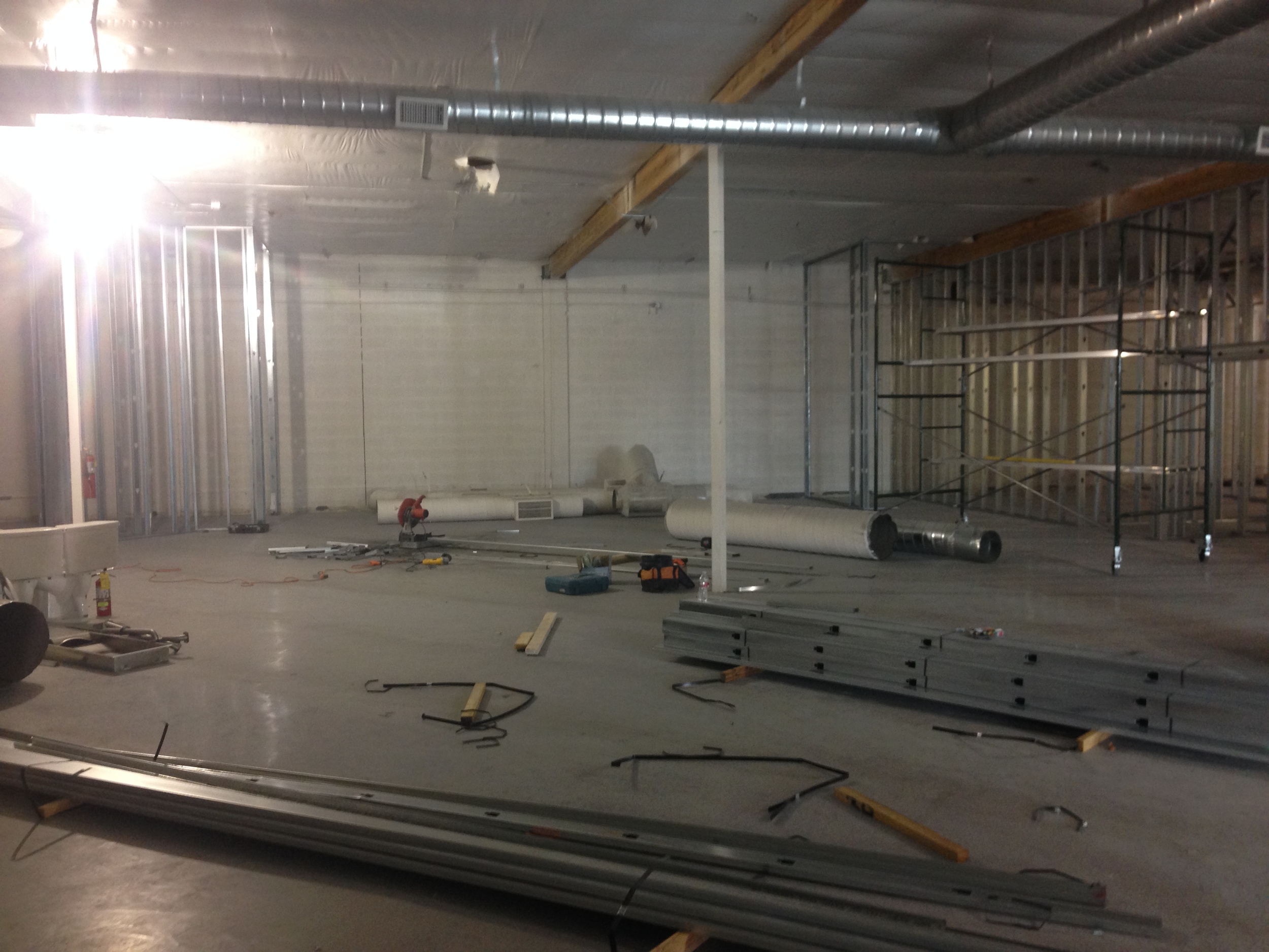 Looking from the back of the gathering space toward the future stage.